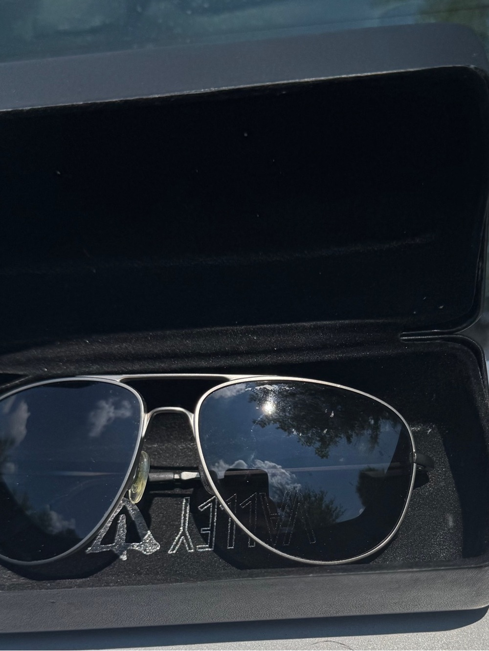 Revo Men’s Aviator Sunglasses in Silver Frame with Dark Blue Lenses